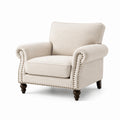 Sillón tapizado en poliéster beige con patas de madera oscura
