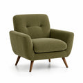 Sillón de pana verde con patas de madera